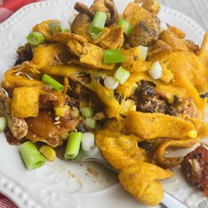 A plate of food with meat and vegetables on it.