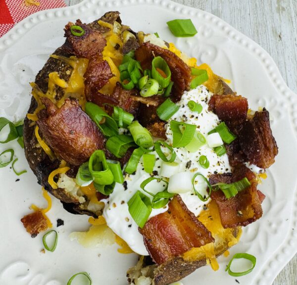 Smoked Loaded Baked Potato with side of Creamy Cucumbers